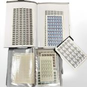 A file containing uncirculated stamps, stamp sheets and world stamps.