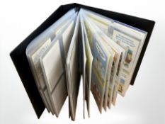 A large postcard album of humorous postcards