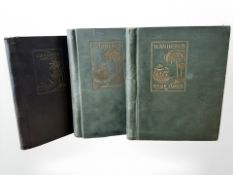 Three vintage stamp albums containing stamps of the world