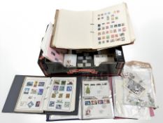 A box of postal strike stamps, albums of world 20th century stamps,