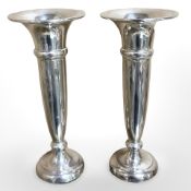 A pair of silver fluted vases, height 13 cm. CONDITION REPORT: Base loaded.