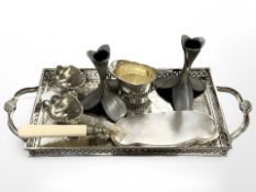 A group of silver plated and pewter wares including flower vases, antique crumb scoop, gallery tray,