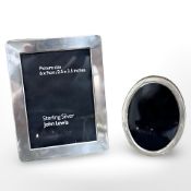 A sterling silver photograph frame, 8 cm x 10.