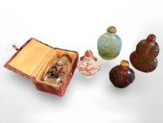 A group of Chinese scent flasks, porcelain and resin examples,