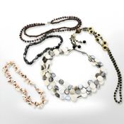 Five necklaces set with polished gemstone and beads, synthetic and natural stones.