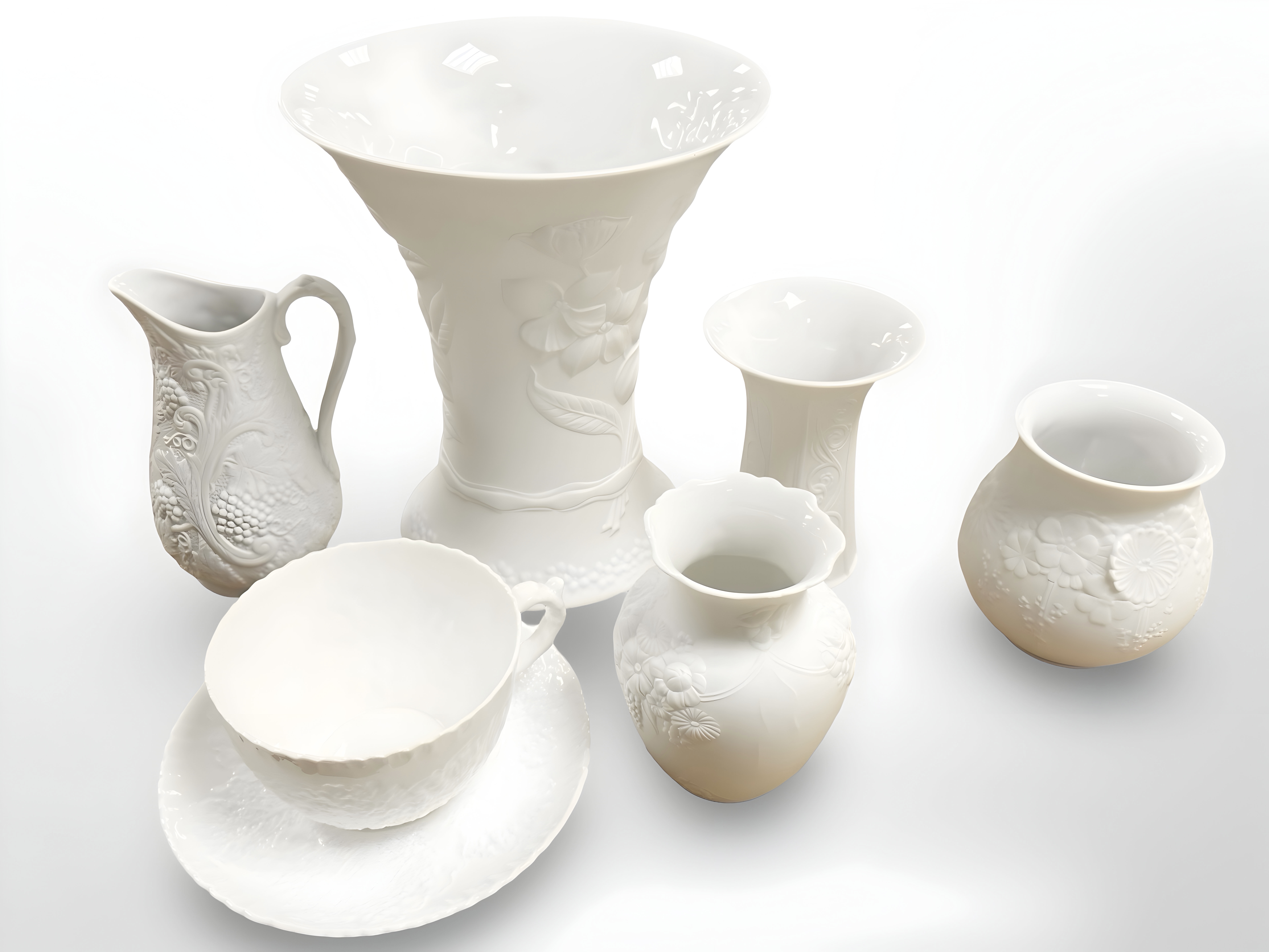 A group of white matte and glazed porcelain, including Portmeirion, Kaiser, etc.