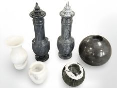 A group of six marble and hard stone ornaments including a pair of lidded urns,