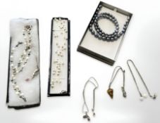 A fine silver necklace with polished stone pendant,