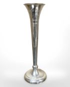 A tall silver spill vase, height 21.5 cm. CONDITION REPORT: Base loaded.