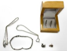A group of Sterling silver jewellery including bracelet set with diamonds, three pairs of earrings,