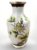 A cloisonne enamelled vase on white ground,