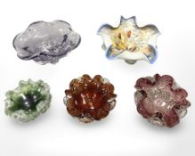 A group of five continental coloured glass dishes, largest diameter 22 cm.