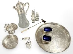 A group of silver plated wares to include claret jug, gallery tray, decanter labels,