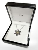 An Ortak Sterling silver pendant on chain