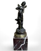A contemporary bronze figure of a flower fairy on rouge marble base, height 28 cm.