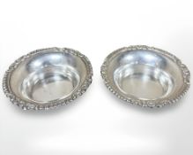 A pair of continental silver coasters, diameter 12.5 cm. CONDITION REPORT: 127.