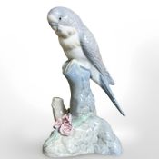 A Spanish figure of a parakeet on plinth, height 15.5 cm.