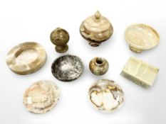 A group of polished hardstone onyx and marble plates, bowls, lidded jar, storage box, etc.