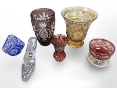 Six pieces of coloured crystal to include a shoe, basket and vases,
