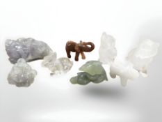 A small group of polished crystal and gem stone animal figures including jade dolphin, lion,