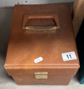 A case of 45rpm records, mostly 80s