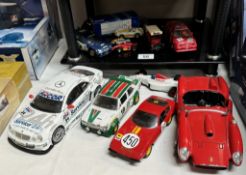 A box of loose mixed scale and maker diecast and plastic vehicles including Hornby Hobbies slot