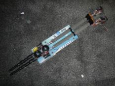 Two Crivit hiking sticks.
