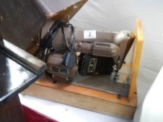 A vintage Singer electric sewing machine, COLLECT ONLY.