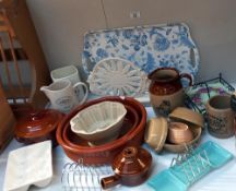 A good lot of Kitchenalia including Stoneware jugs, Laura Ashley egg holder & toast racks etc