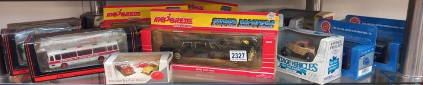 A mixed lot of boxed Diecast including EFE vanguards etc