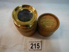 A leather cased 'The Captain Cook' magnifier.