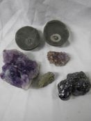 Two fossils and a quantity of crystals.