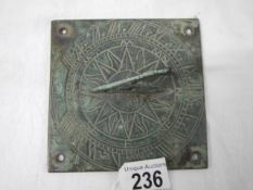 An old brass sundial.