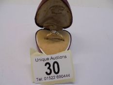 An 18ct gold diamond set ring, size L, 2 grams.