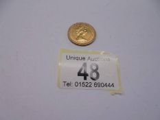 A 1980 Queen Elizabeth II full gold sovereign.