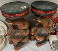 A pair of solid teak sitting elephant plant stands. Height 41cm
