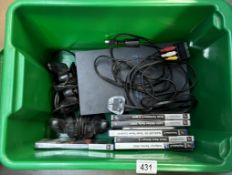 A Playstation 2 with 2 controllers & A quantity of games
