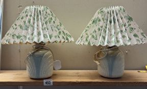 2 pottery based bedside lamps
