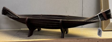 An unusual fruit bowl in the shape of a boat. Length 68cm