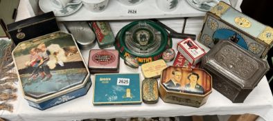 A quantity of vintage tin boxes etc
