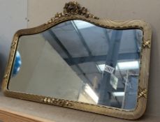 An ornate arch-topped gilt framed mirror (73 x 50cm approximately)