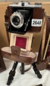 A vintage Nettar 35mm camera on tripod