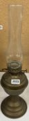 A vintage brass oil lamp