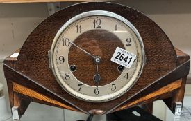 An inlaid art deco mantel clock