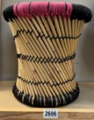 A decorative wicker stool