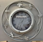 A decorative wall clock (Pressed metal maple lead & dragonfly motifs) Diameter 60cm approximately