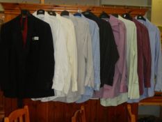 A man's jacket and a quantity of shirts etc.,