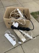 A box of various extension leads