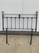 A metal bed headboard
