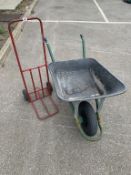 A wheelbarrow & trolley